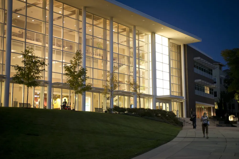 Dwire Hall at night.