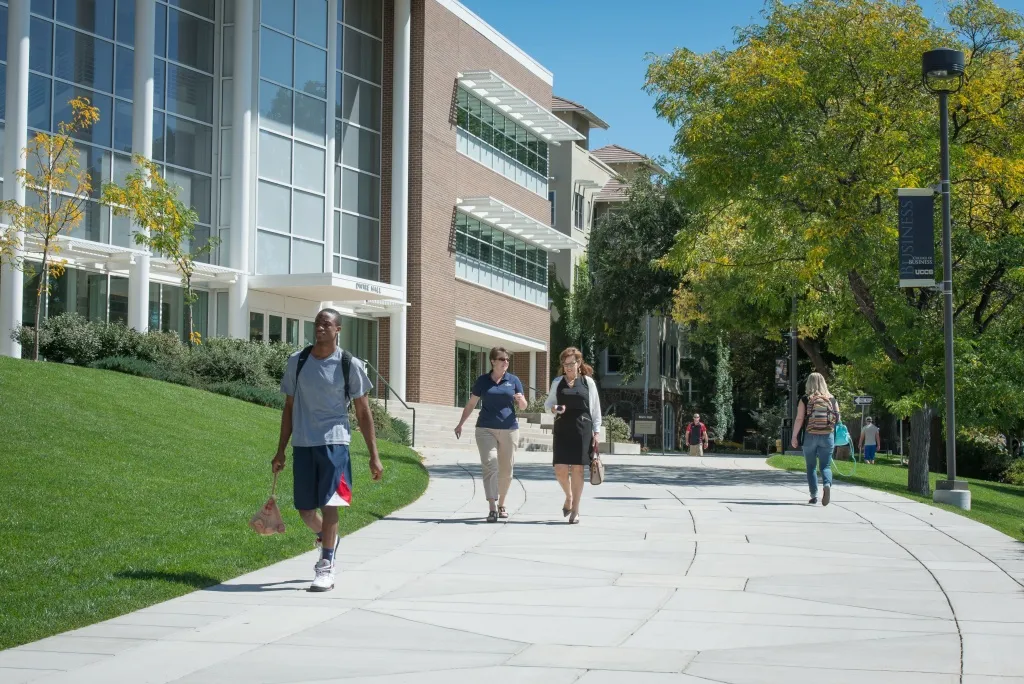 staff and students walking on campus
